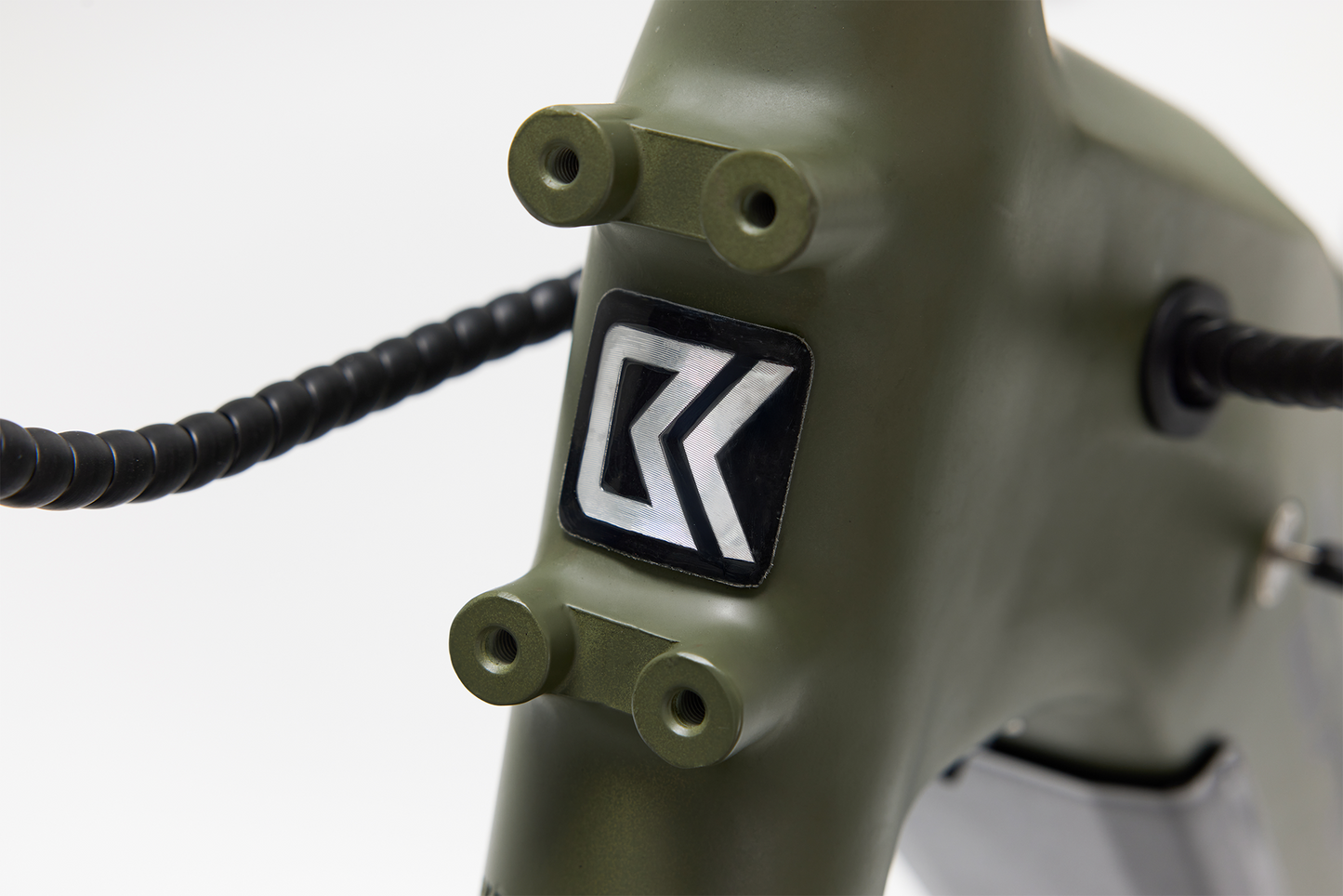 Bakcou Flatlander SD E-Bike – Angled Close-Up of Frame Badge, Matte Army Green