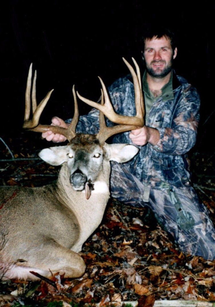 Chuck Main with a trophy whitetail buck taken on an Epicenter Outdoors-managed property
