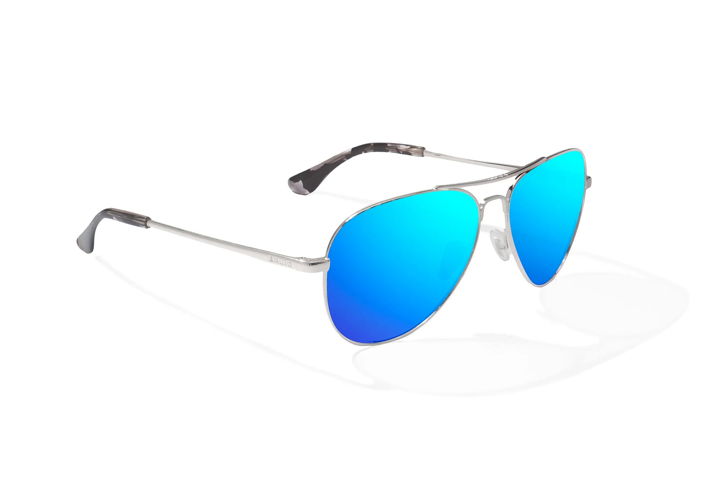 Bajio Soldado Sunglasses - Angled View, Silver Gloss Frame with Blue Mirror Lens