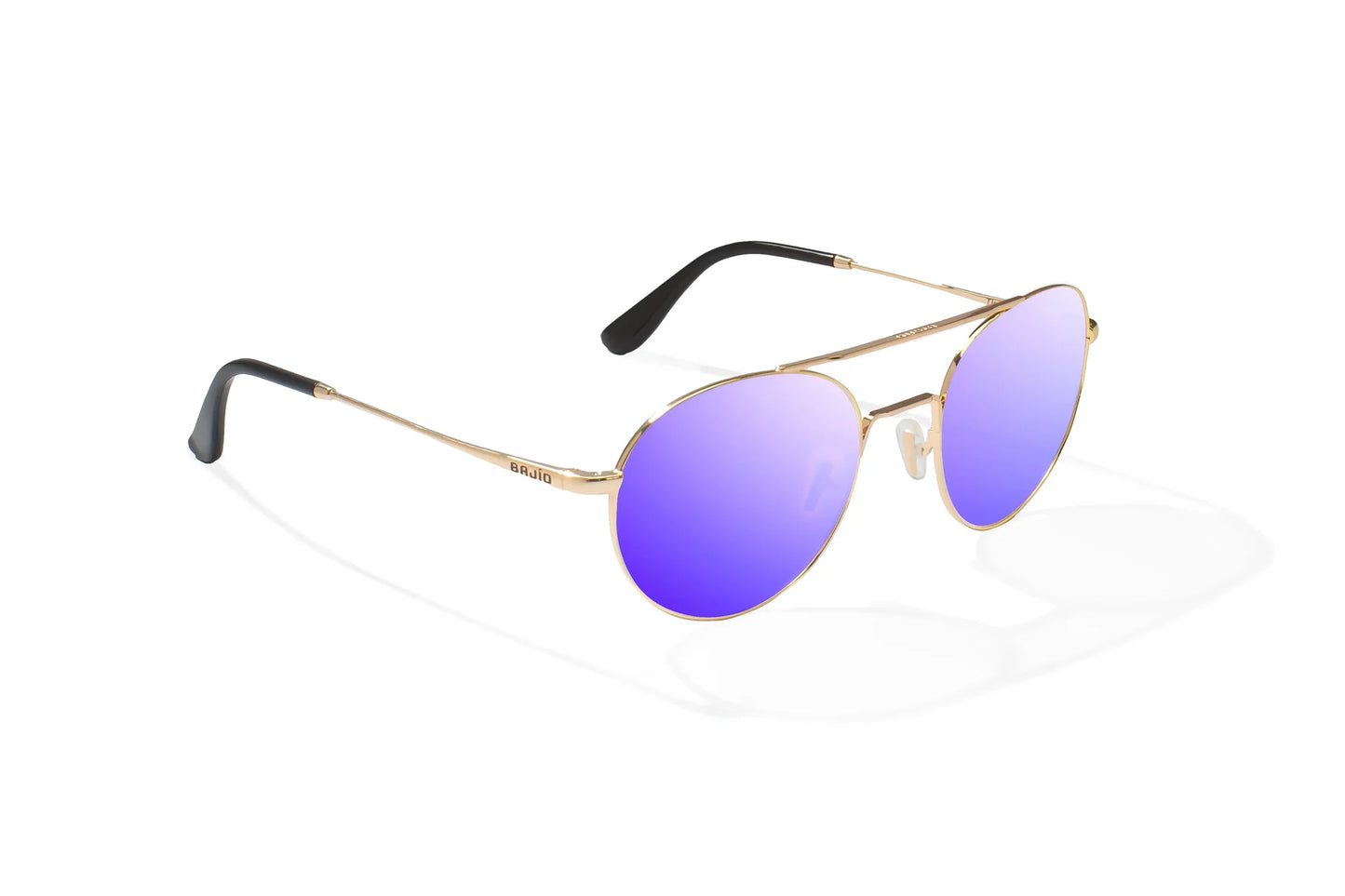 Bajio Tionia Sunglasses - Angled View, Classic Gold Gloss Frame with Violet Mirror Lens