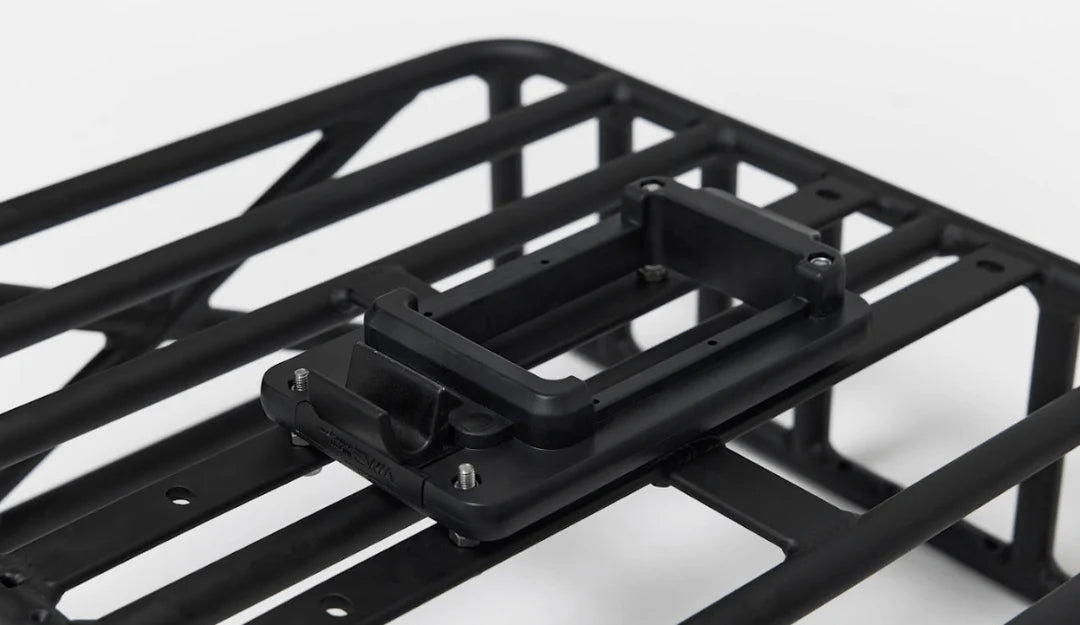 Bakcou pannier rack mounted on rear of e-bike for additional storage and cargo hauling