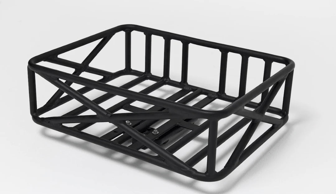 Side view of Bakcou pannier rack showing heavy-duty frame and attachment system