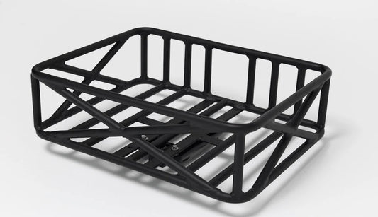 Side view of Bakcou pannier rack showing heavy-duty frame and attachment system