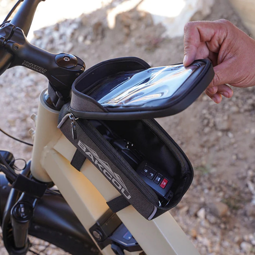 Inside view of the Bakcou Phone Bag revealing a zippered storage compartment for keys, tools, and small essentials.