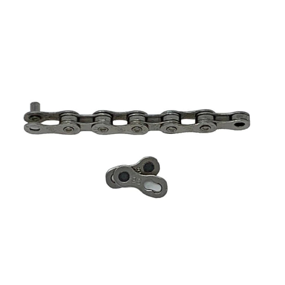 Close-up of extra chain section and master link included in the Bakcou Trailside Repair Kit for emergency chain repairs.