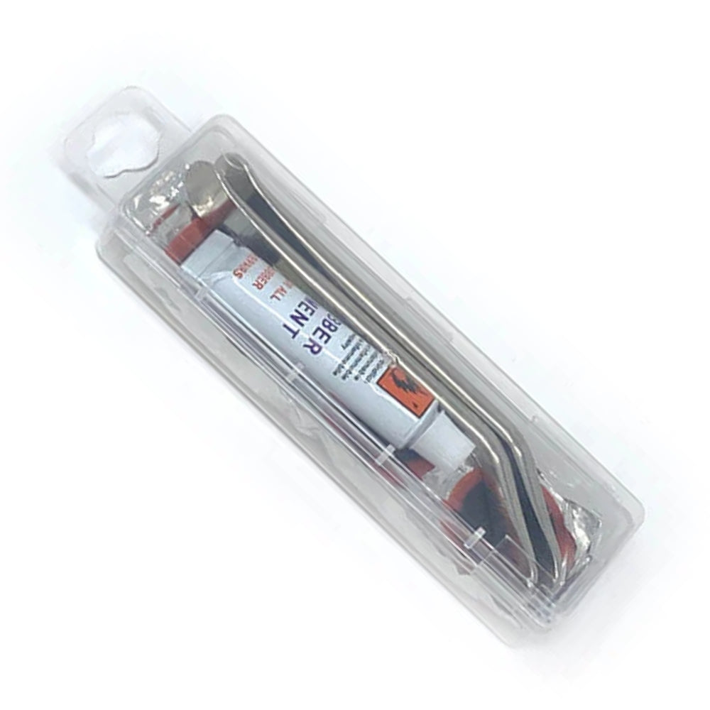 Close-up of the tire patch kit from the Bakcou Trailside Repair Kit, featuring rubber patches, tire irons, and rubber cement for quick flat tire fixes