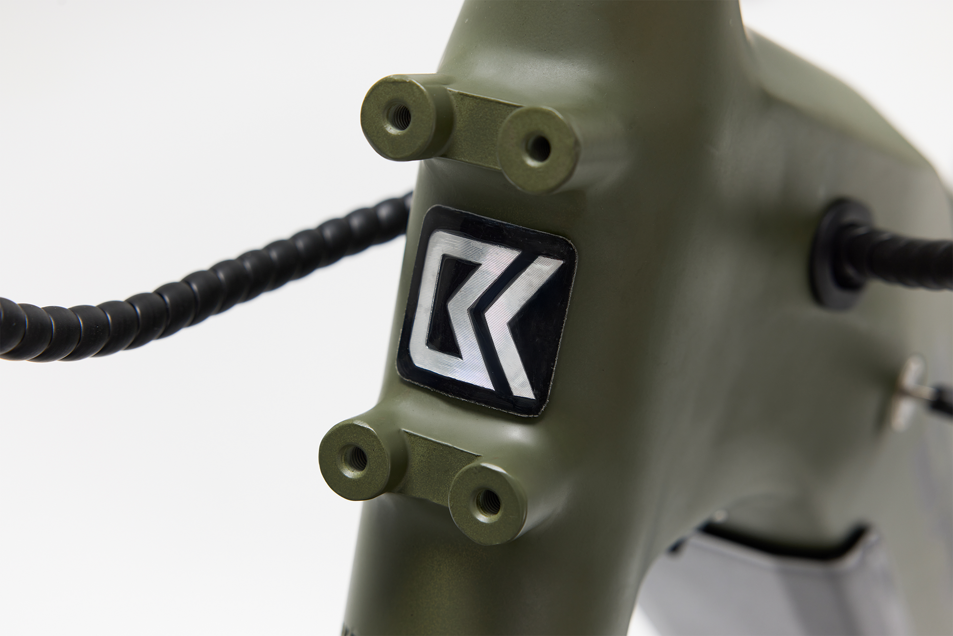 Bakcou Flatlander SD E-Bike – Angled Close-Up of Frame Badge, Matte Army Green