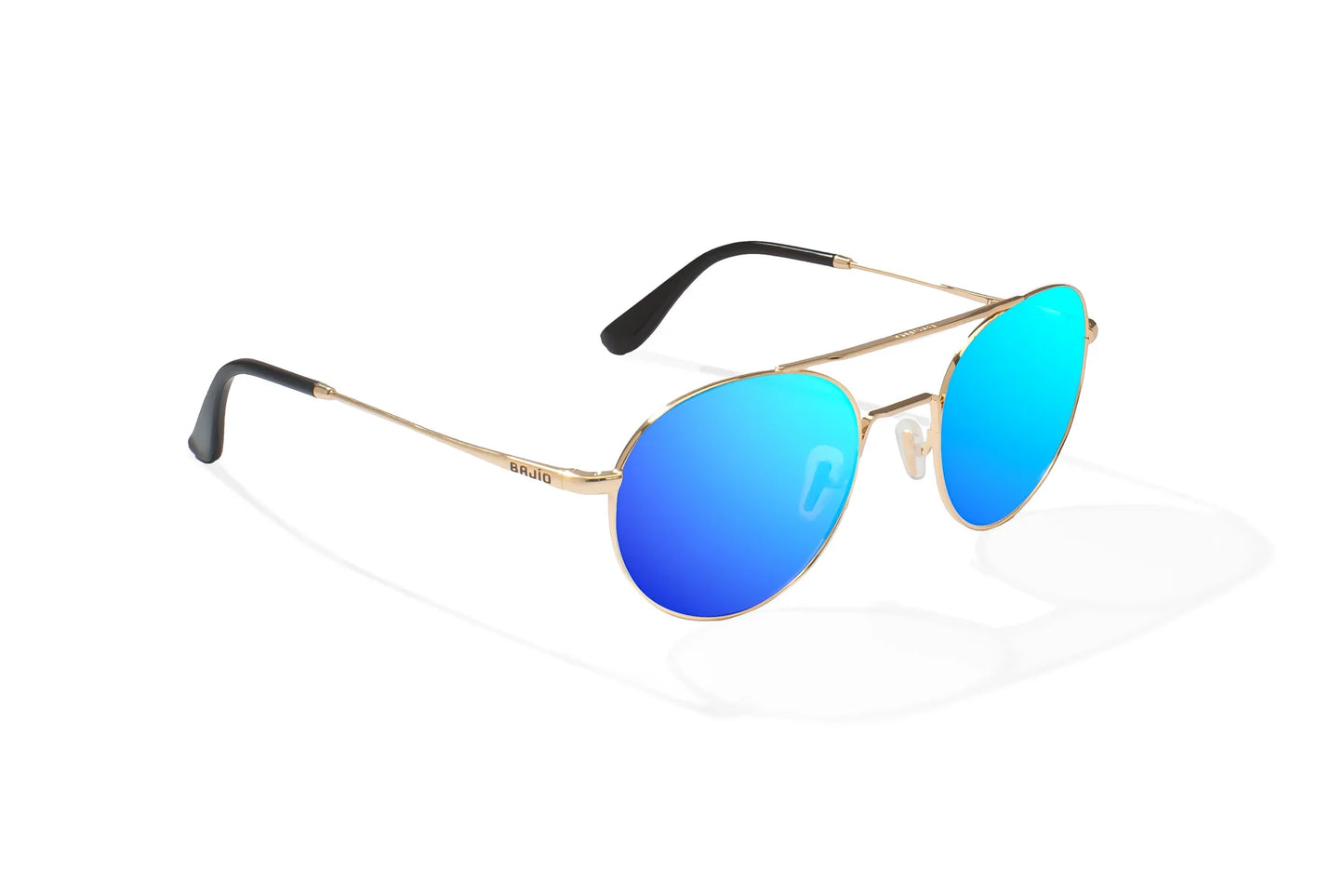 Bajio Tionia Sunglasses - Angled View, Classic Gold Gloss Frame with Blue Mirror Lens
