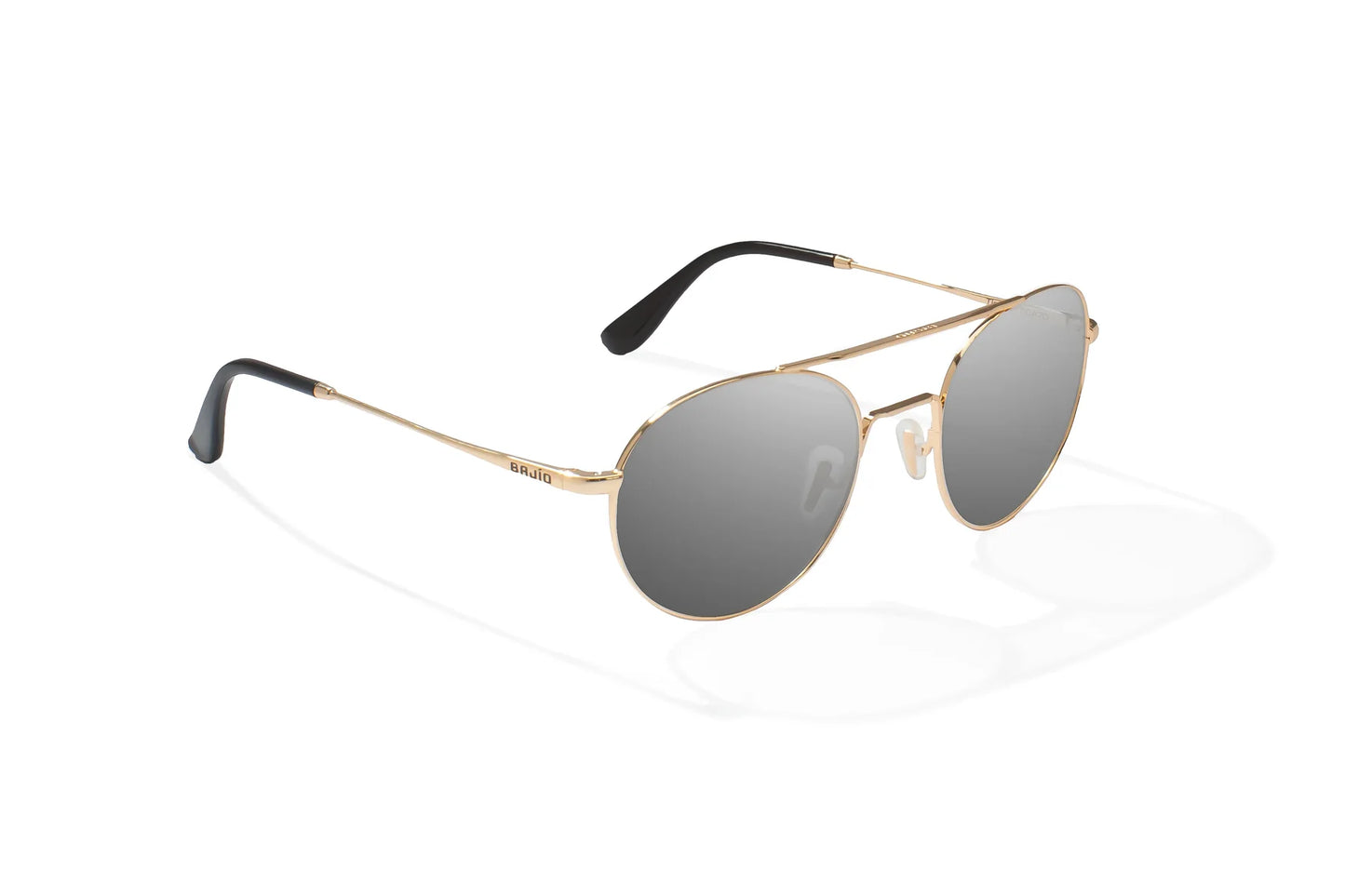 Bajio Tionia Sunglasses - Angled View, Classic Gold Gloss Frame with Gray Lens