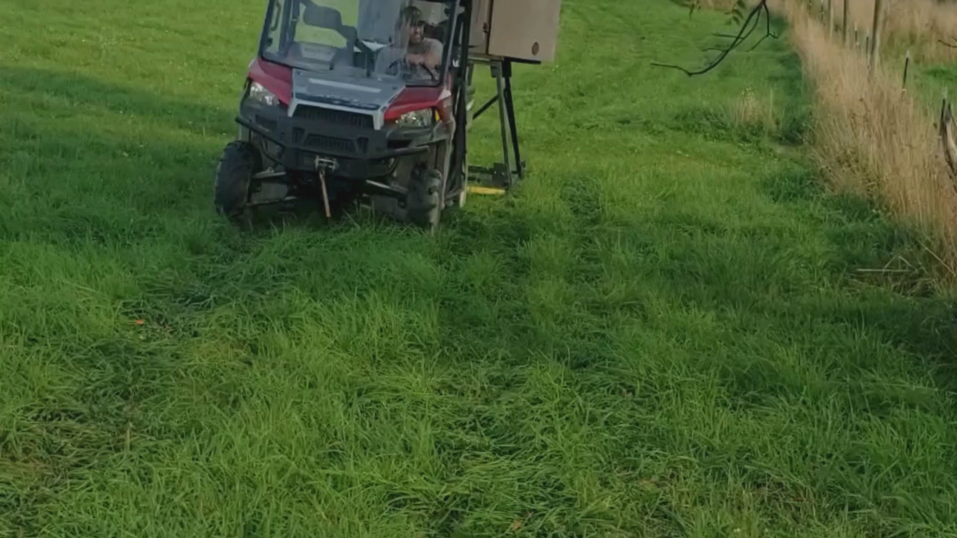 Load video: Banks Outdoors Blind Skid Kit pulling a hunting blind across a field.
