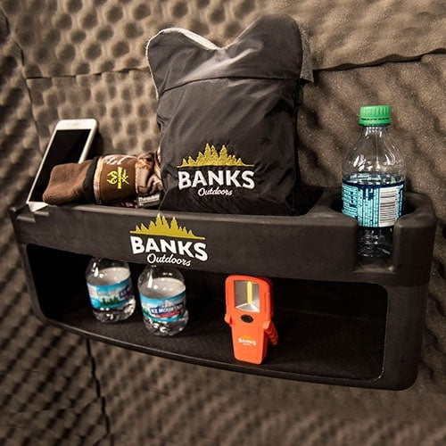 The Storage Shelf is a blind storage compartment that easily attaches to the wall of any Banks Stump Blind. Store all of your hunting gear and personal belongings in one convenient location. In an effort to reduce unwanted noise and movement, all shelves are lined with a rubber padding.