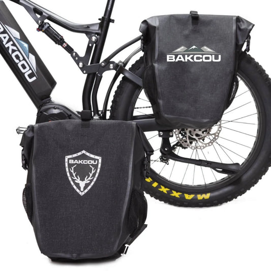 Bakcou Pannier Bags securely attached to an e-bike, showcasing waterproof roll-top closure and durable canvas construction for off-road adventures.